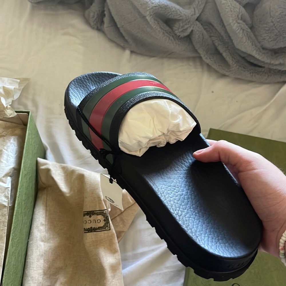 Gucci slides 10 1/2 brand new never worn comes w covers for the slides w box